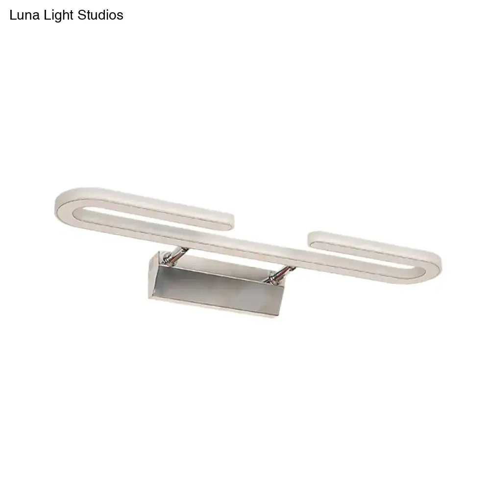 Modern chrome paper clip vanity light fixture with silver-toned led light and sleek curved arms for bathroom use
