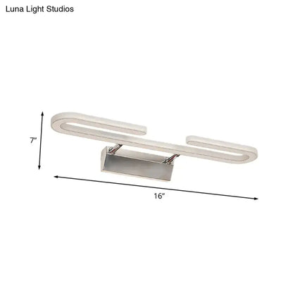 Modern chrome paper clip vanity light fixture with sleek curved design and brushed metallic finish for bathroom use