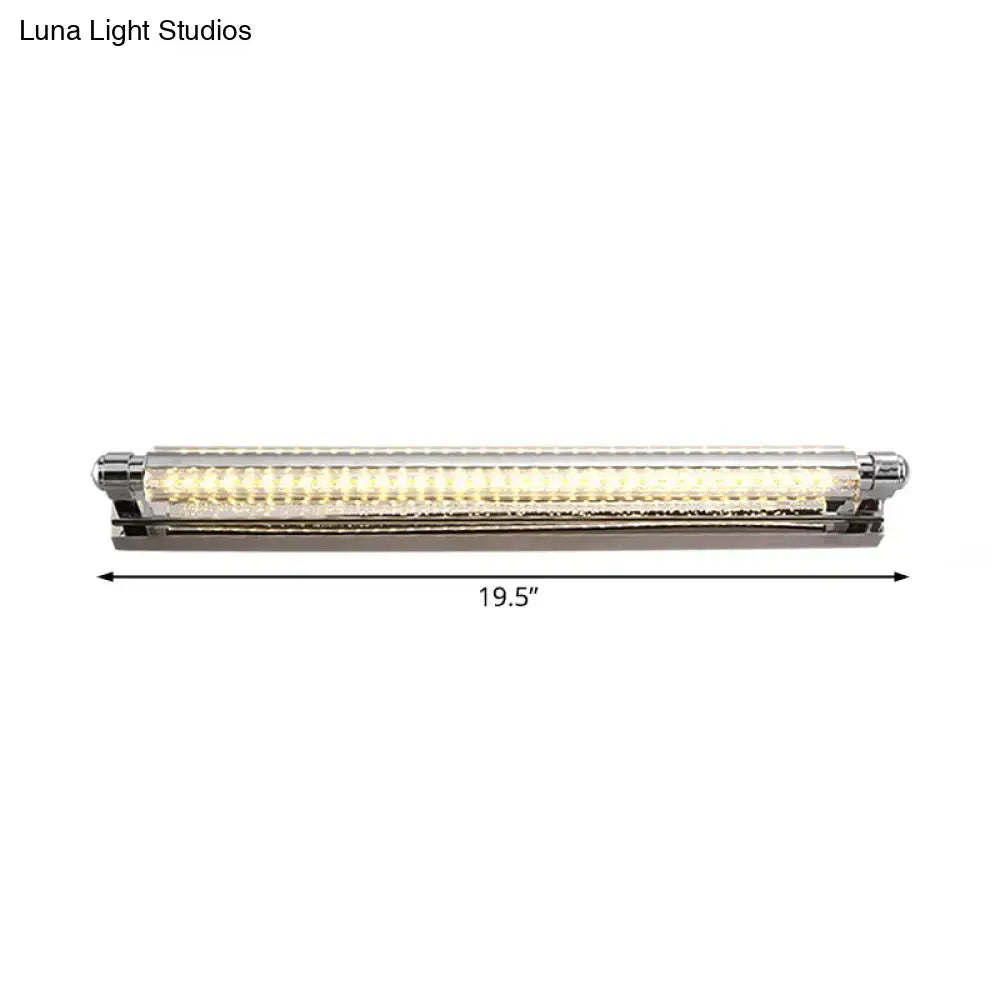 A sleek 19.5-inch modern chrome pipe acrylic vanity lighting fixture with warm white embedded LED illumination