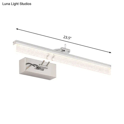 Silver-finished modern chrome rectangle wall vanity light with textured glass and adjustable arm for targeted bathroom illumination