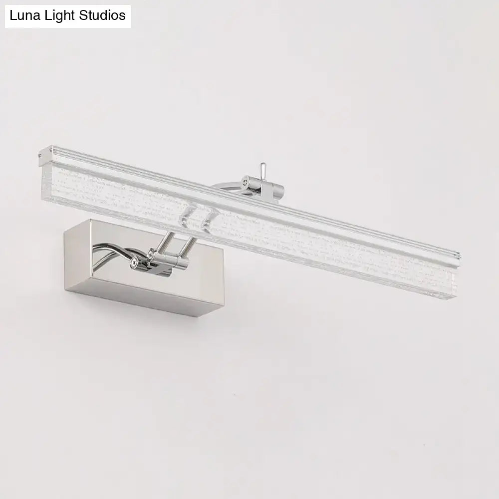 Modern chrome rectangle wall vanity light with sleek design and textured glass diffuser for bathroom use