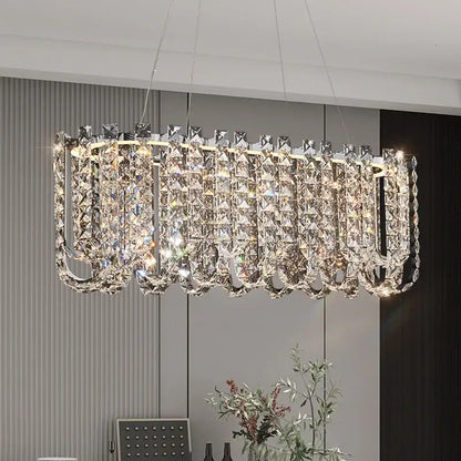 Modern chrome rectangular crystal pendant ceiling lamp with cascading prisms for dining room decorbites crystal pendant