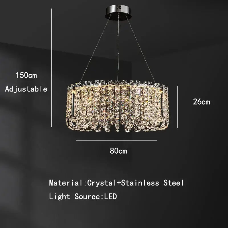 A modern chrome rectangular crystal pendant ceiling lamp with a stainless steel frame and cascading clear crystals