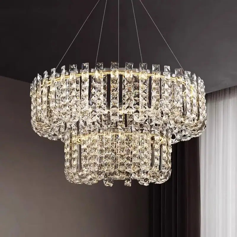 Modern chrome rectangular crystal pendant ceiling lamp with two-tiered clear glass prisms illuminated by warm led lights