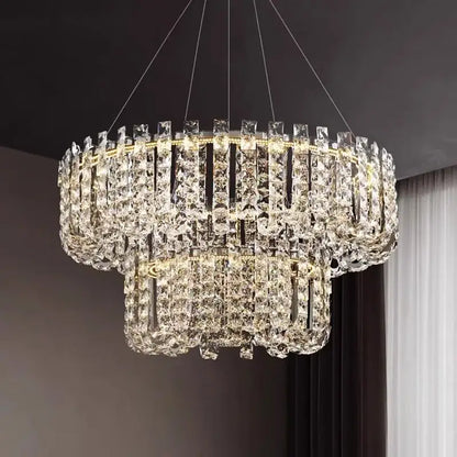 Modern chrome rectangular crystal pendant ceiling lamp with two-tiered clear glass prisms illuminated by warm led lights