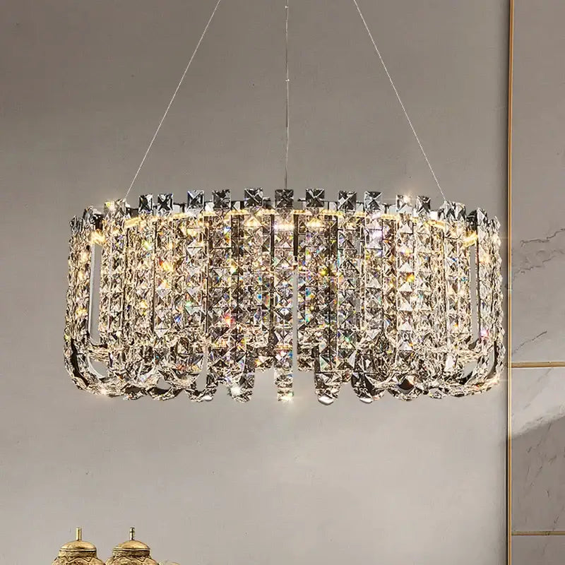 A modern chrome rectangular crystal pendant ceiling lamp with cascading clear faceted crystals for elegant decorbites crystal pendant decor