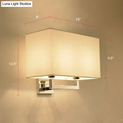 Modern chrome rectangular fabric wall sconce with cream shade and metal frame compatible with 110v-120v or 220v-240v light types