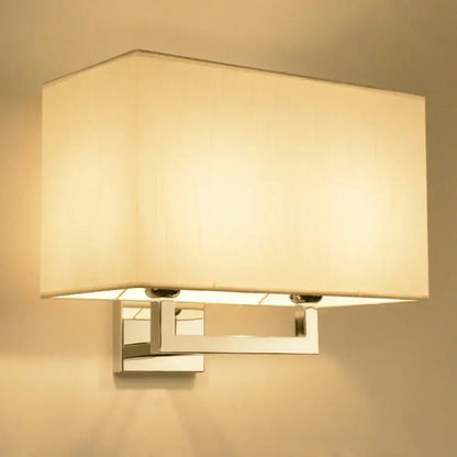 Modern chrome rectangular fabric wall sconce with cream shade and polished metal frame for 110v-120v or 220v-240v light type