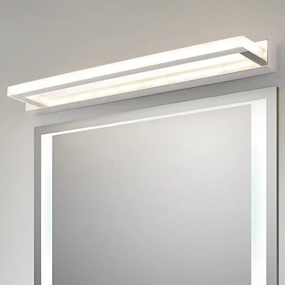 Modern chrome rectangular led sconce bathroom wall light with sleek white and chrome finish mounted above mirror