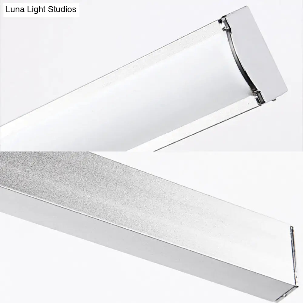 Modern chrome rectangular led wall light with sleek frame and frosted glass diffuser for bedroom sconce use