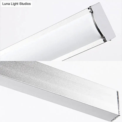 Modern chrome rectangular led wall light with sleek frame and frosted glass diffuser for bedroom sconce use