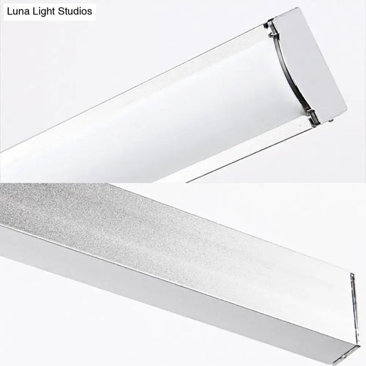Modern chrome rectangular led wall light with sleek frame and frosted glass diffuser for bedroom sconce use
