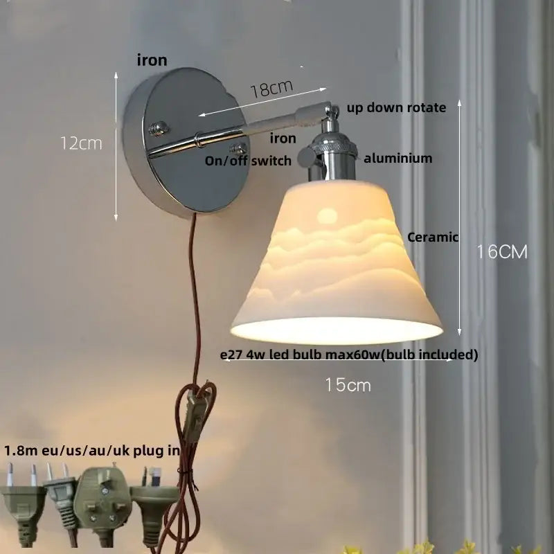 Modern chrome ribbed clear glass wall lamp with adjustable metallic arms and ceramic sunrise shade for bedroom decorbites clear glass