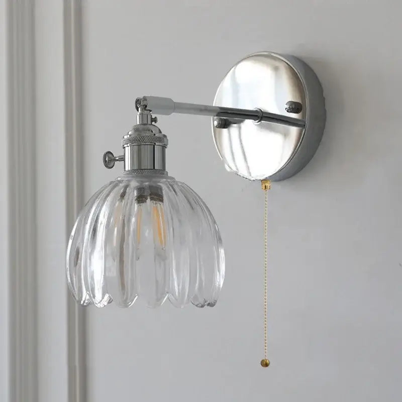 Modern chrome wall lamp with clear glass ribbed shade and metal arm for dining room decorbites clear glass design