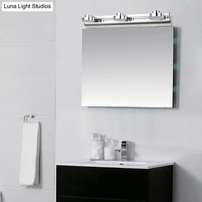 Modern chrome rectangular bathroom mirror with integrated three-light vanity fixture featuring round wall lamps and acrylic shades