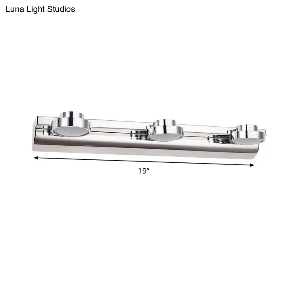 A sleek 19-inch modern chrome round wall lamp with acrylic shade and three circular led bulbs for bathroom use