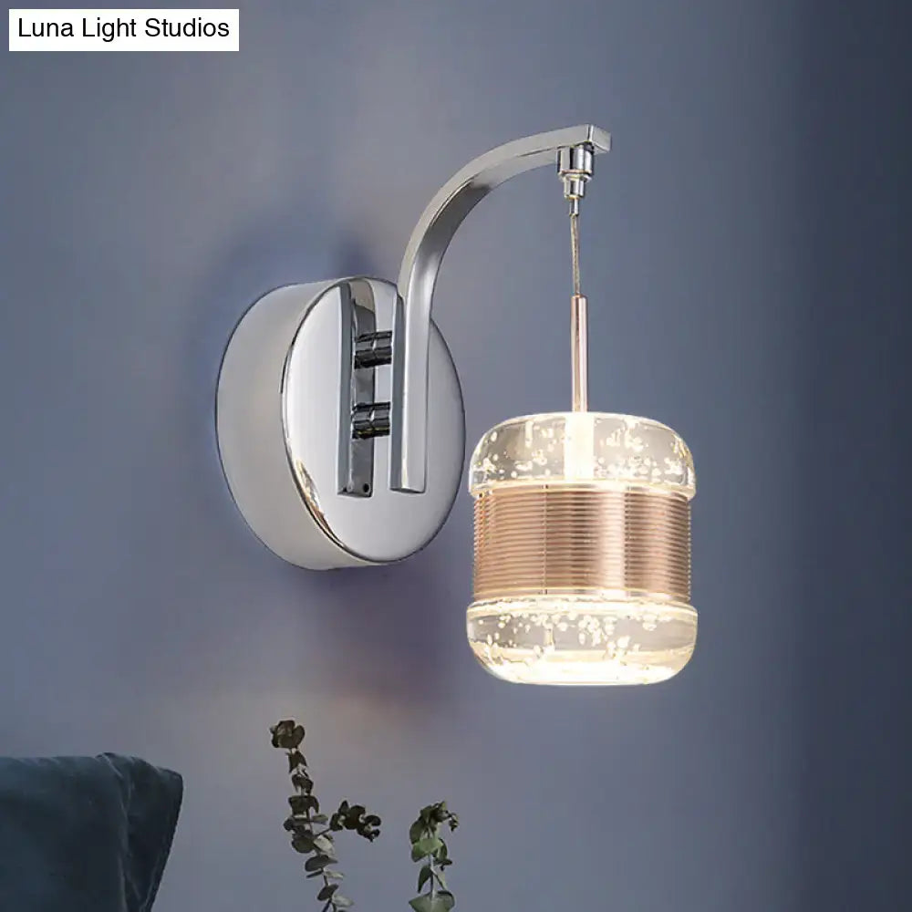 Modern chrome seeded crystal wall lamp with cylindrical glass shade featuring gold-toned ridges and sparkling particles light fixture
