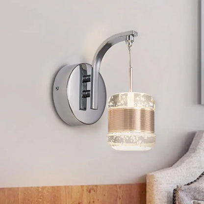 Modern chrome seeded crystal wall lamp with cylindrical glass shade, gold-toned bands, and embedded led light fixture