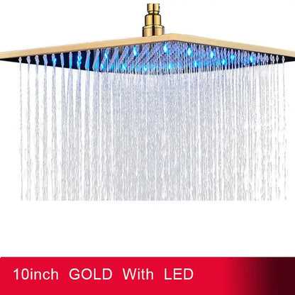 A 10-inch gold square led rainfall shower head with blue edge lights and sleek metallic finish flows water downward