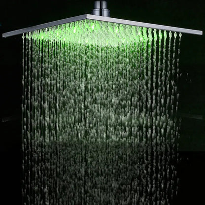 Modern chrome square led rainfall shower head with brushed metallic finish and green led light illuminating water streams