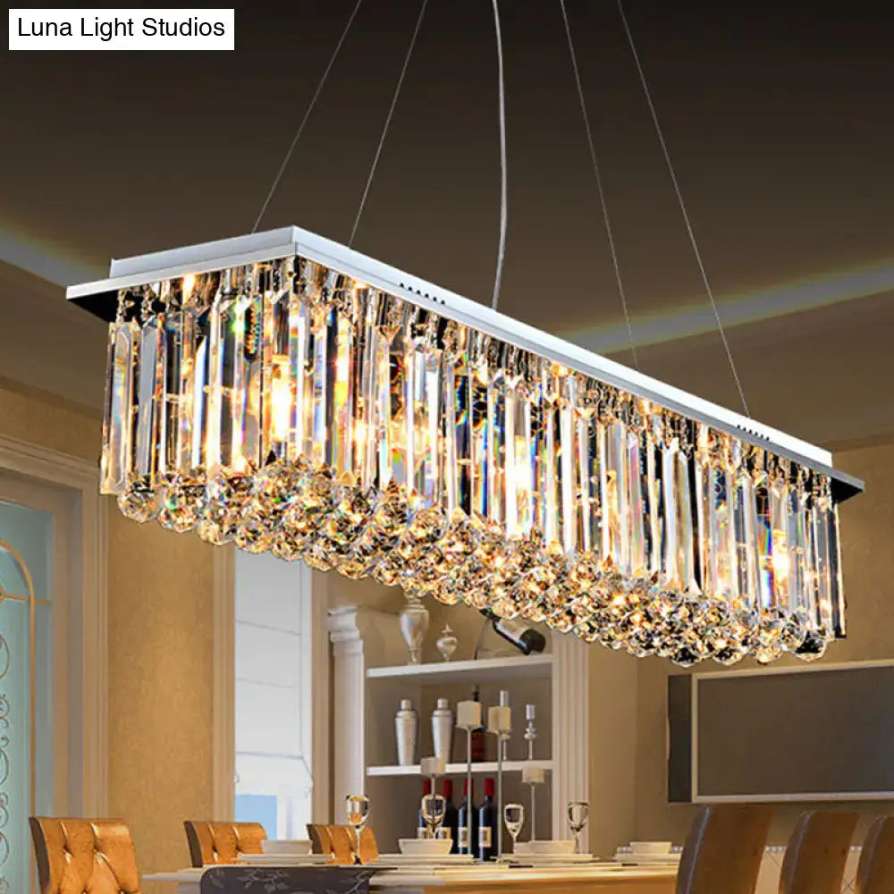 Rectangular crystal chandelier with sleek silver frame and clear glass prisms in stainless steel for modern restaurant use