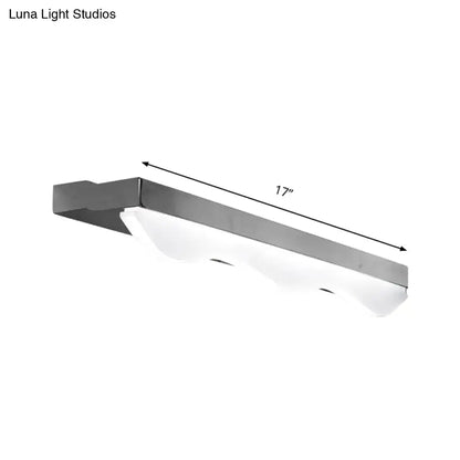 Modern chrome stainless steel vanity light featuring a 17-inch frosted glass linear LED design for bathrooms