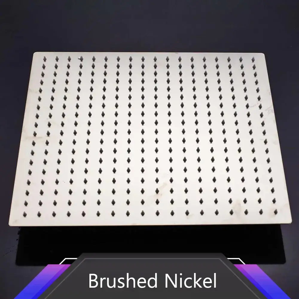 Modern chrome stainless steel rainfall shower head with brushed nickel finish and diamond-shaped nozzles for bathroom use