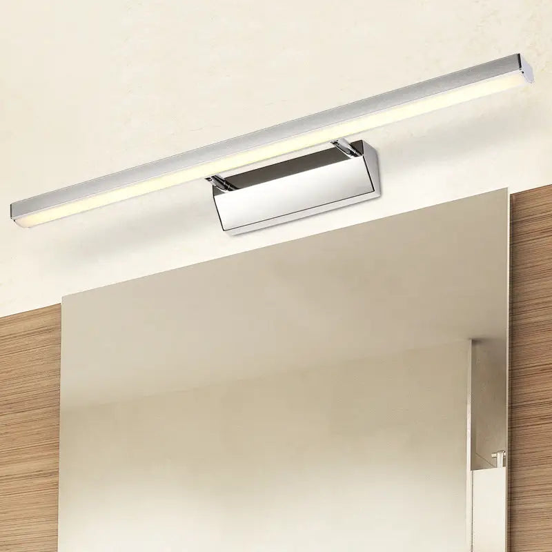 Modern chrome stainless steel stick vanity light fixture with sleek rectangular led design mounted above mirror