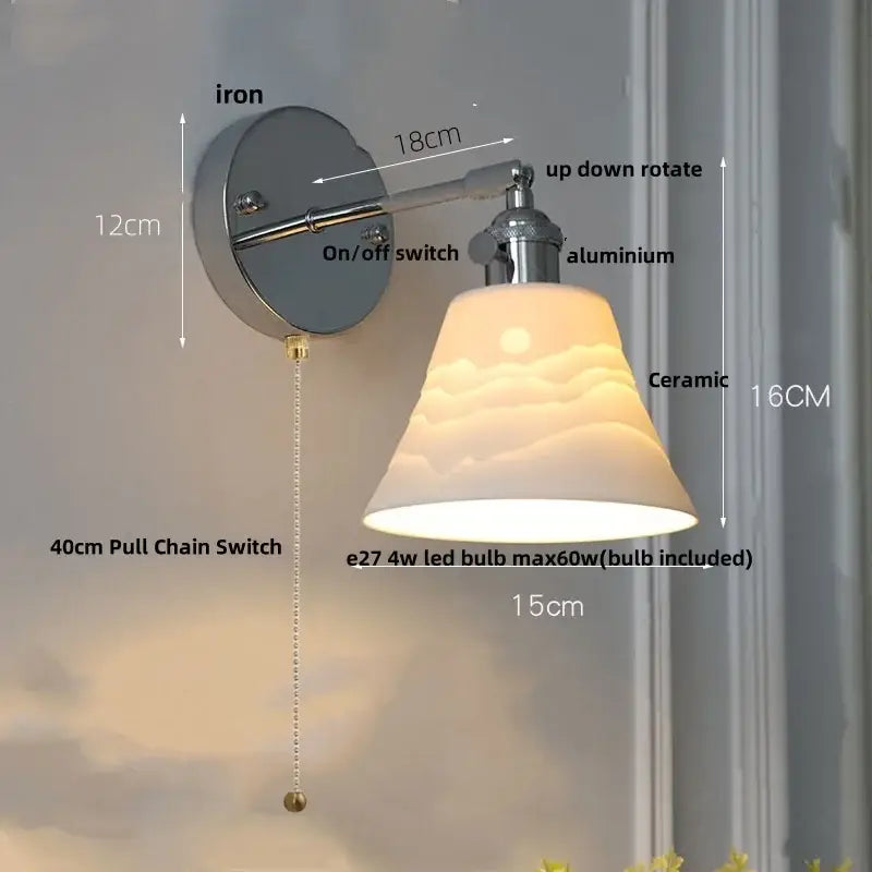 A sleek modern chrome sunrise iron ceramic led wall light with adjustable metallic arm and ceramic shade for bedroom decor