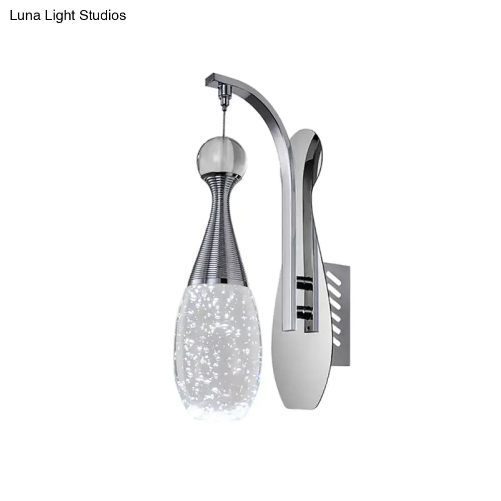 Modern chrome teardrop led sconce with sleek curved arm and seeded crystal glass shade for bedroom wall lighting