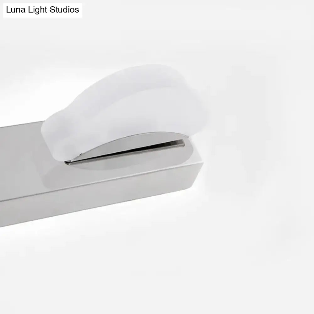 Modern chrome three light vanity mirror light with frosted glass diffuser and warm color temperature for bathroom
