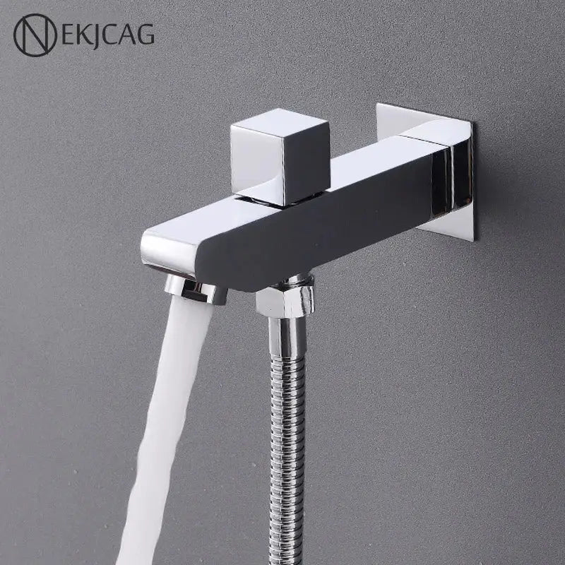 Modern chrome tub spout filler with wall-mounted bidet spray featuring a sleek square handle and flexible hose