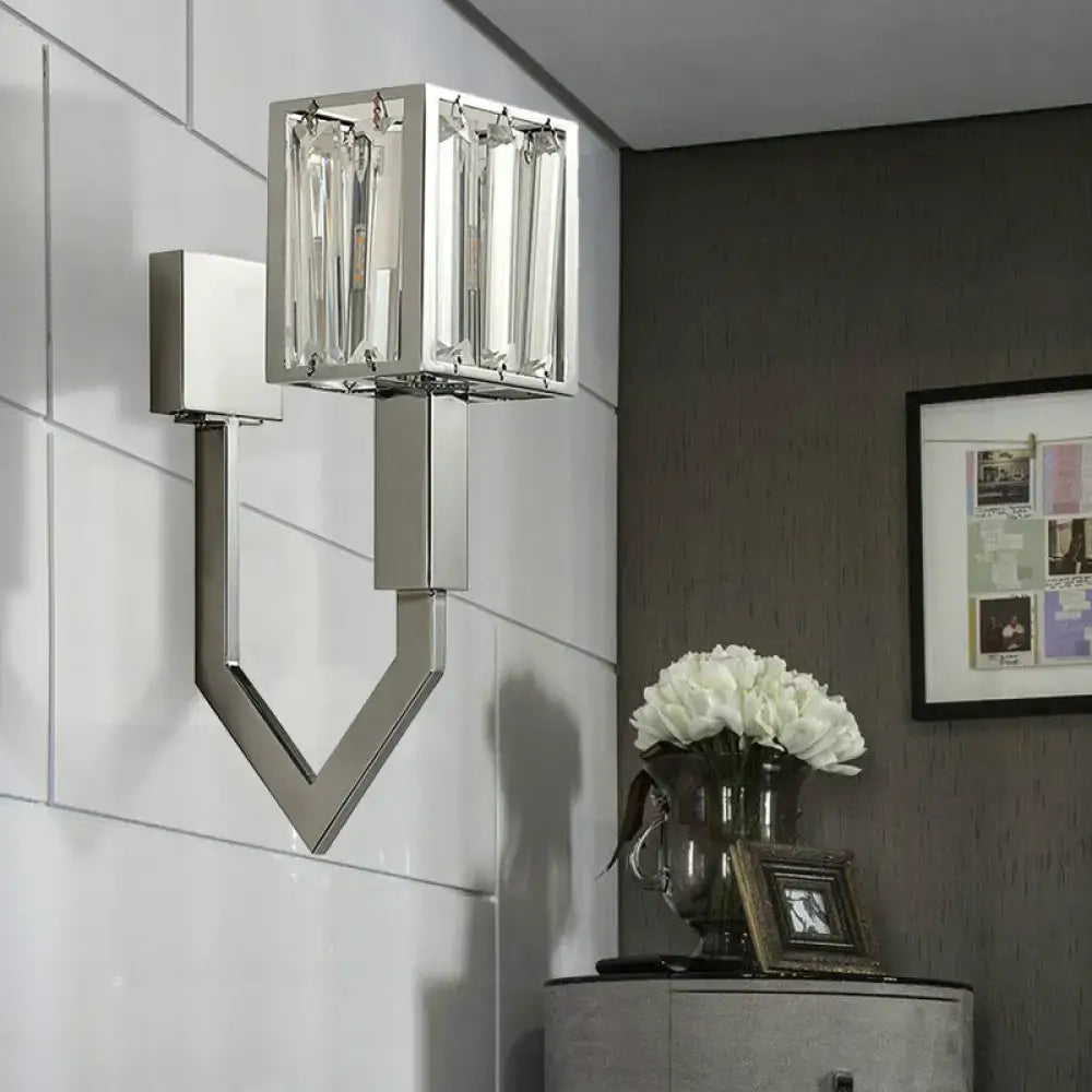 Modern chrome wall lamp with metal frames featuring clear crystal vertical accents for elegant living room lighting