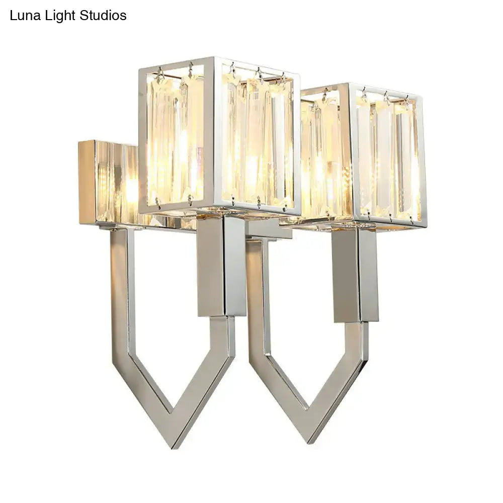 Modern chrome wall lamp with clear crystal rectangular panels and metal frames for living room lighting
