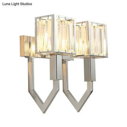 Modern chrome wall lamp with clear crystal rectangular panels and metal frames for living room lighting