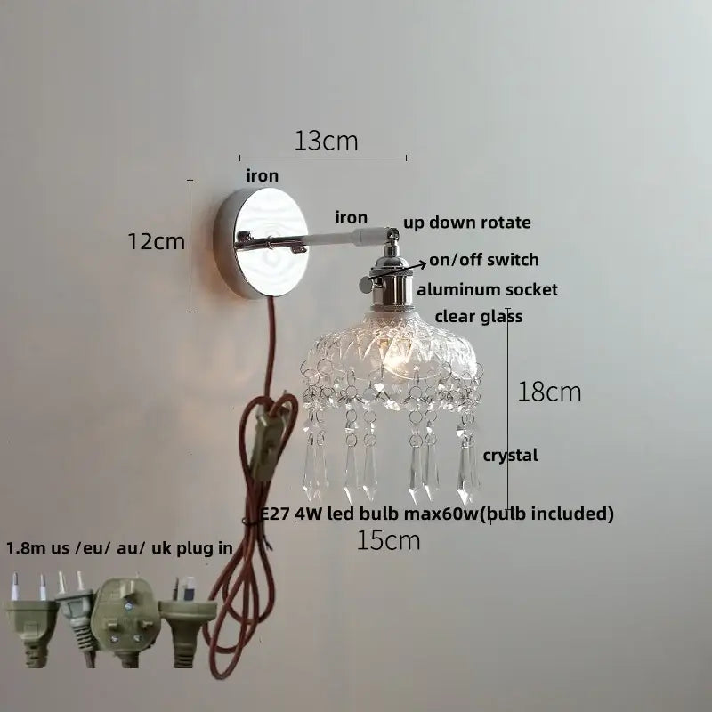 Modern chrome wall light with polished iron base, adjustable arm, and clear glass shade with crystal droplets for decorbites ceramic led wall