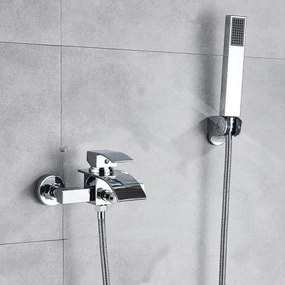Modern chrome waterfall bathtub shower faucet with sleek angular design and matching handheld showerhead mounted on wall