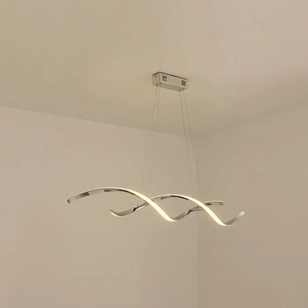 Modern chrome wave led island lighting with sleek flowing double spiral design for stylish kitchen island lighting