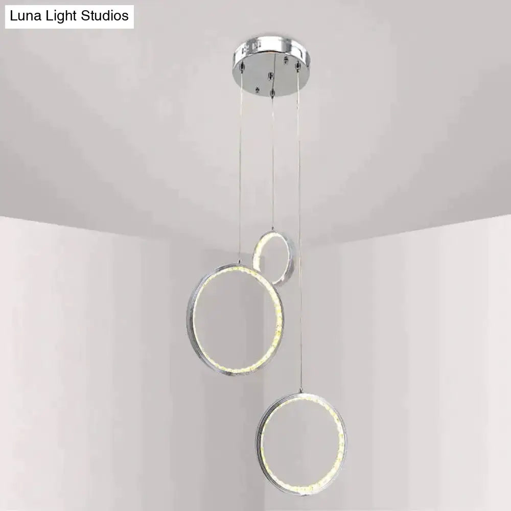 Modern chrome-finished circle led crystal pendant lamp with three glowing rings for dining room or corridor lighting