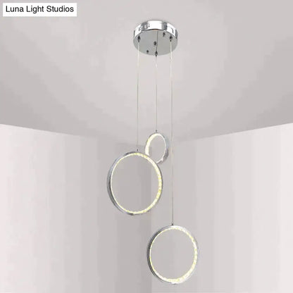 Modern chrome-finished circle led crystal pendant lamp with three glowing rings for dining room or corridor lighting