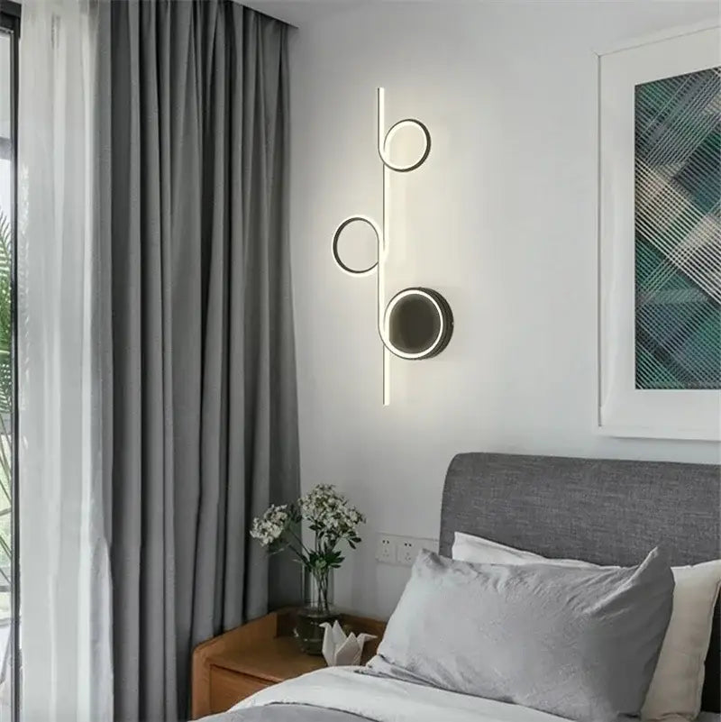 Modern circle straight bar wall lamp with three circular LED lights on a metallic rod for bedroom and living room decorbites circle straight