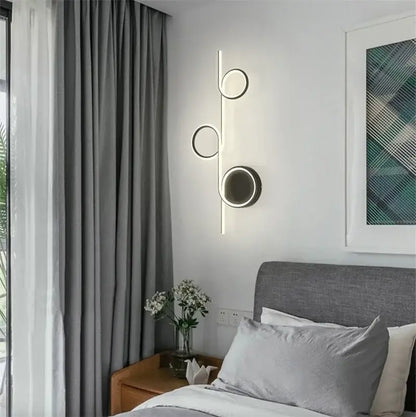 Modern circle straight bar wall lamp with three circular LED lights on a metallic rod for bedroom and living room decorbites circle straight