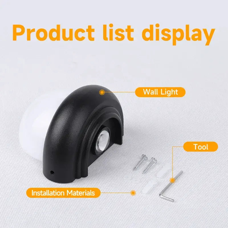 Modern circular black solar wall light with decorbites acrylic led featuring a black plastic mount and white bulb