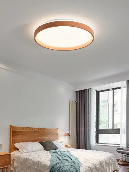 Modern circular black and white decorbites ceiling lamp with warm wood frame and soft white LED light for bedroom decor