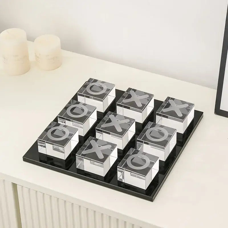 Modern clear acrylic tic tac toe set with engraved black x and o symbols on sleek black base for decorbites geometric crystal chess