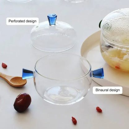 Modern clear and green decorbites glass bowl set with blue-tinted handles and perforated lid for kitchen simmer pot use