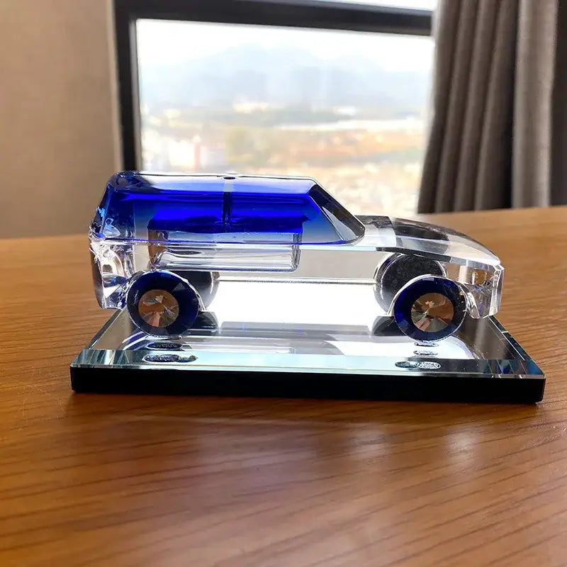 Modern clear and blue crystal car figurine with vibrant blue roof and wheels on mirrored base for living room decorbites crystal car