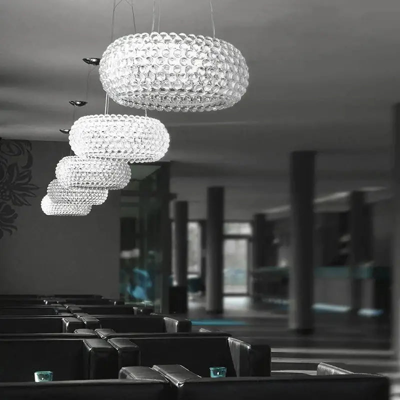 Modern clear bubble caboche led chandelier with faceted crystal and tiered design for living room lighting