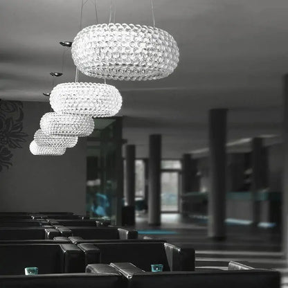 Modern clear bubble caboche led chandelier with faceted crystal and tiered design for living room lighting
