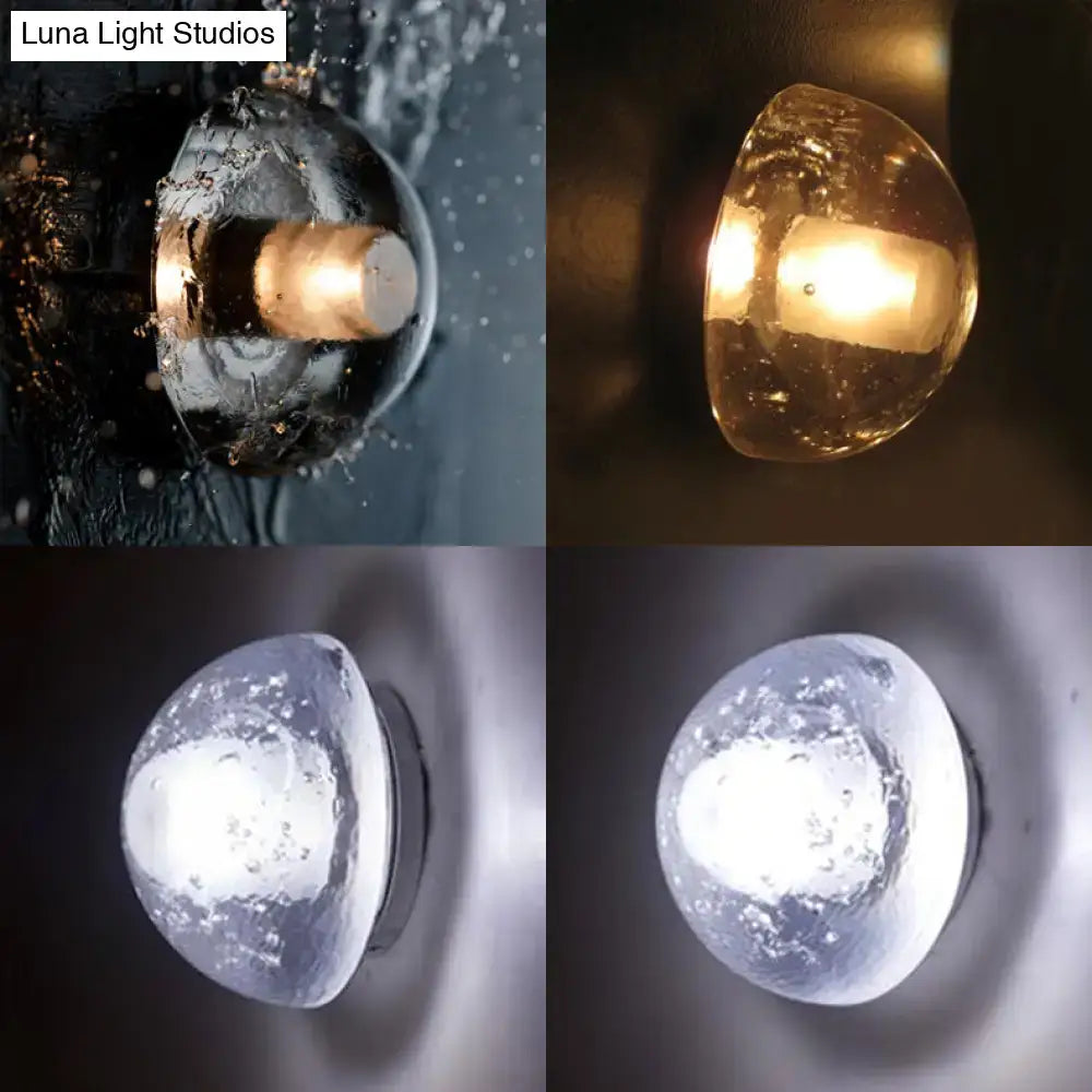 Modern clear bubble crystal wall light with frosted glass dome and warm white illumination for living room use